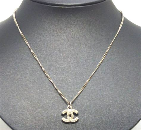 chanel logo pendant silver|chanel pearl necklace cc logo.